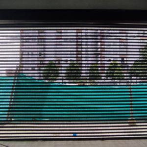 PUERTA ENROLLABLE MICROPERFORADA ECO